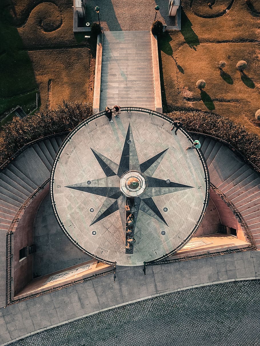 aerial photography of compass-themed terrace, photograph of tower HD wallpaper