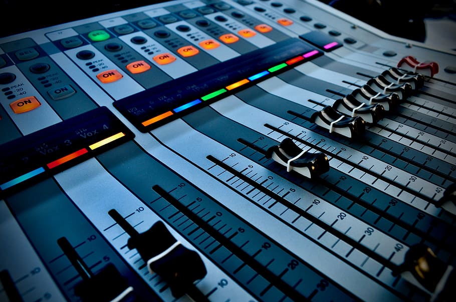 close-up photo of audio mixer, yamaha, band, singer, sound mixer
