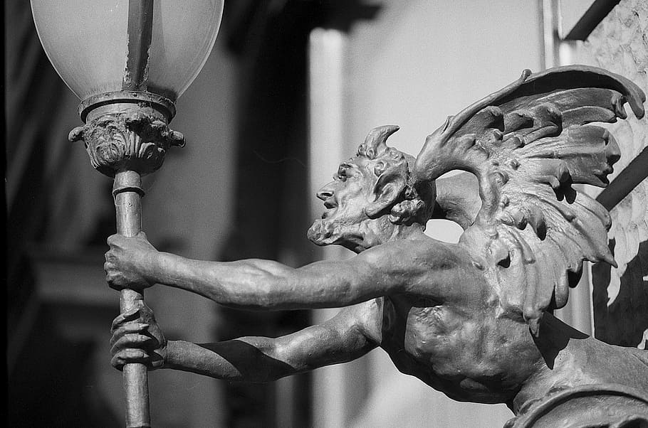 devil holding lamp statue, torch, architecture, mean, vicious HD wallpaper