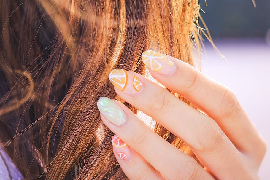 woman finger with orange diy nail arts, women, females, people
