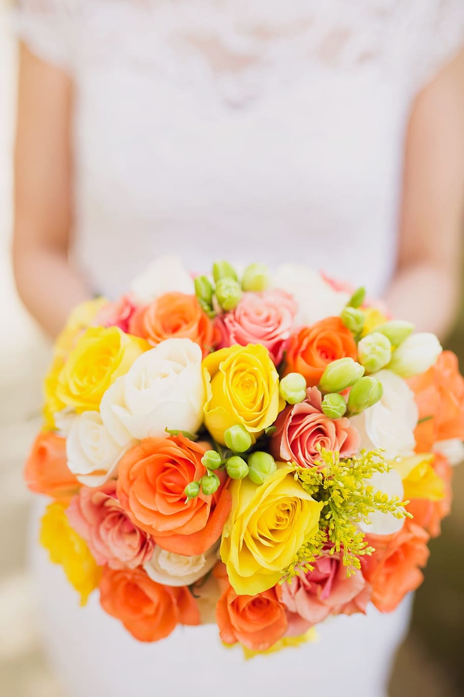 woman wearing white cap-sleeved dress holding yellow-orange-and-white rose bouquet, HD wallpaper