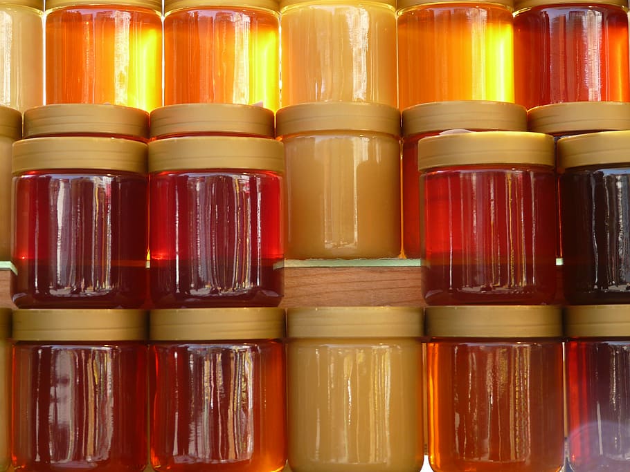 clear glass jars with brown lids, honey, honey jar, honey for sale