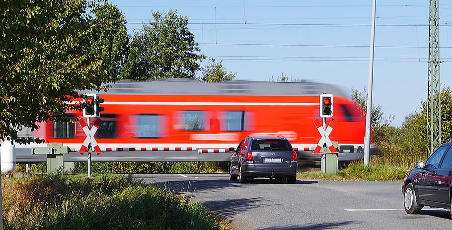 black SUV near passing train, level crossing, transit, barriers HD wallpaper