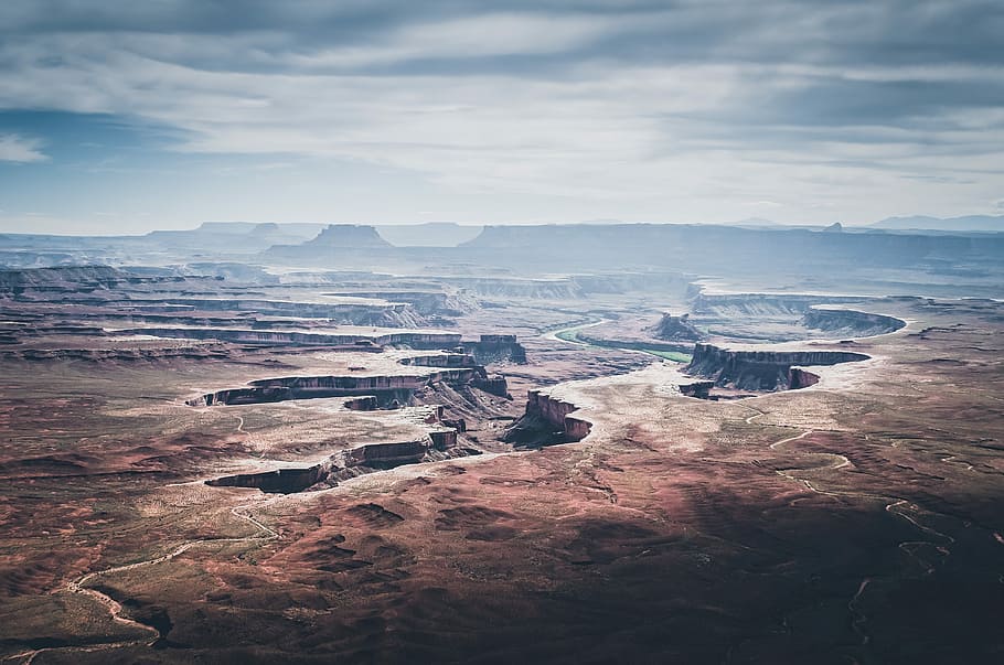 landscape photography of rock formation, skyline photo of brown hills below sky HD wallpaper