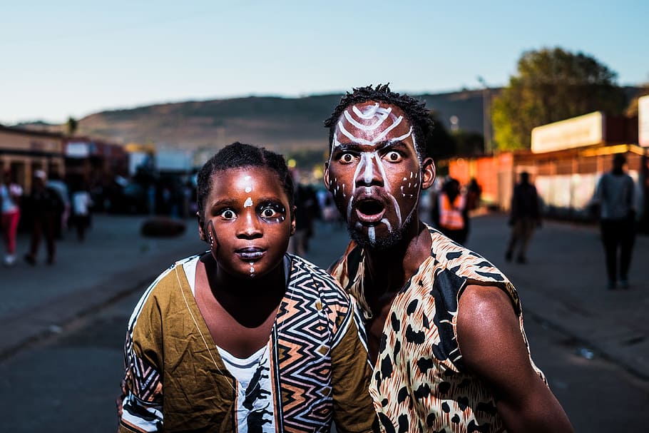 two people with face paints taking photo in street, People of Mamelodi, Pretoria HD wallpaper
