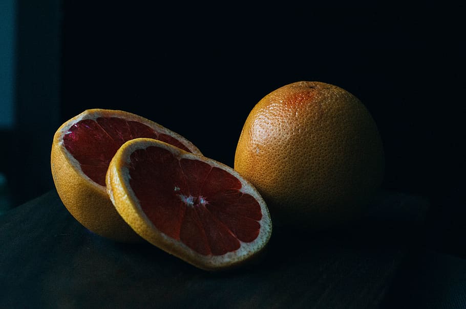 sliced yellow lime, closeup photography of sliced melogold fruit HD wallpaper