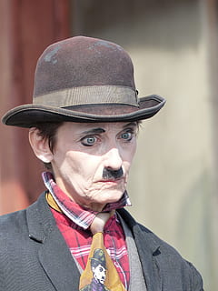 man in Charlie Chaplin costume, copy, circus, white, sad, expression HD wallpaper