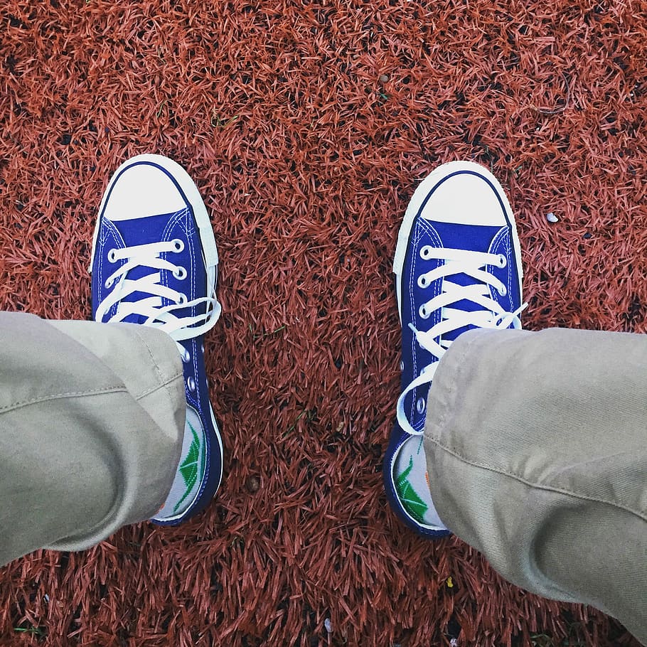 person wearing blue-and-white low-top sneakers, person wearing blue-and-white low-top sneakers and khaki pants HD wallpaper