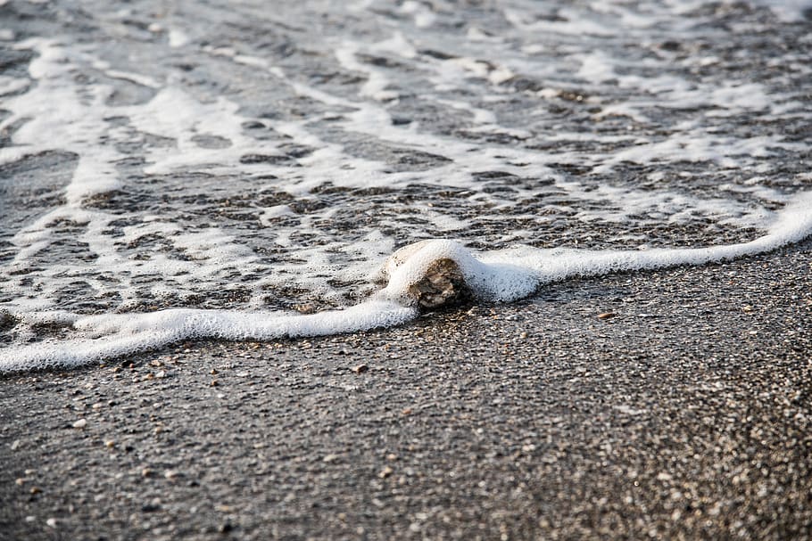 wave, beach, stone, foam, approach, blur, edge of the sea, sand HD wallpaper