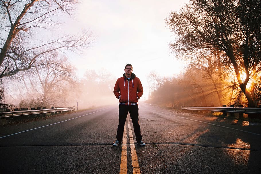 man standing on paved road near trees, guy, street, jacket HD wallpaper
