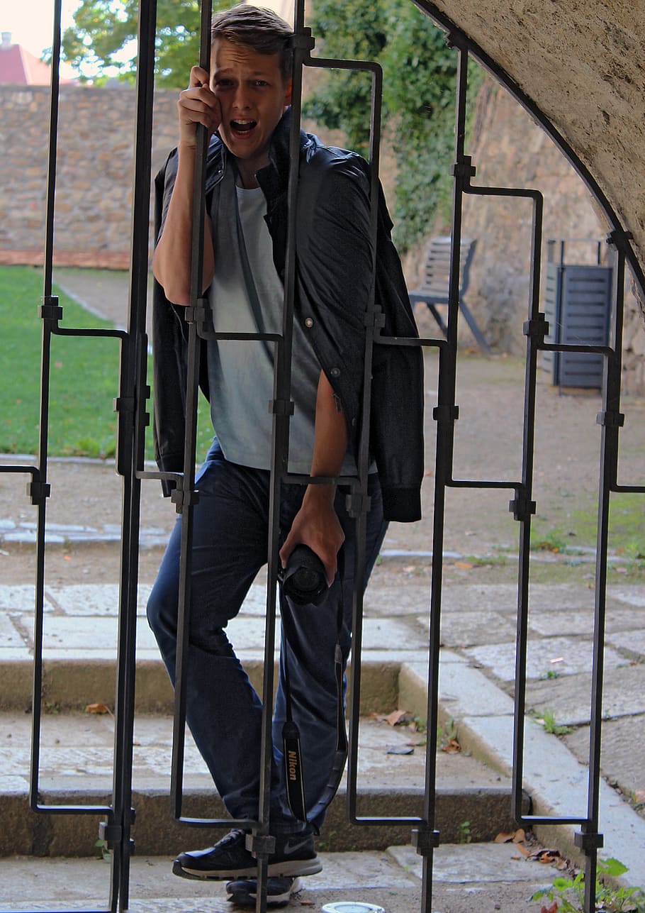 gate, boy, city, sand, real people, one person, front view HD wallpaper