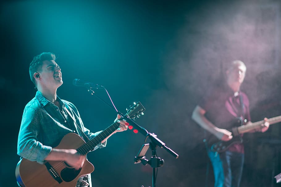 acoustic guitar player on stage