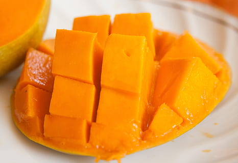 sliced of mango fruit on white surface, exotic, orange, ripe HD wallpaper