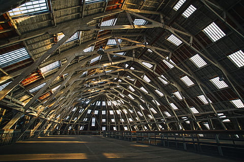 This is a wide angle shot of one of the main wooden buildings at Chatham Dockyard in Kent HD wallpaper