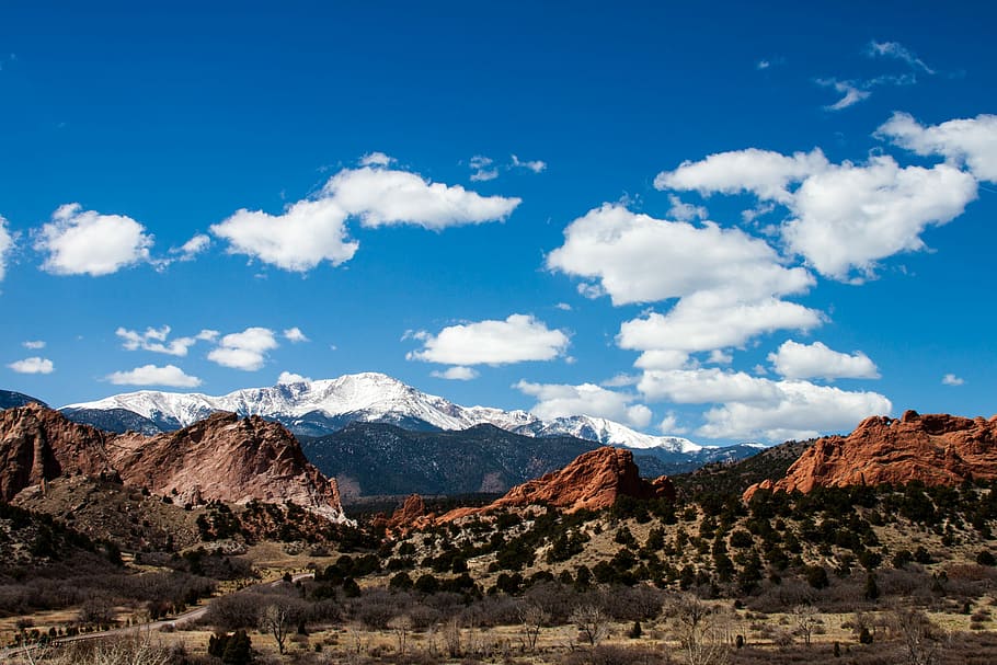brown mountains under cloudy sky at daytime, brown butte rock formations HD wallpaper