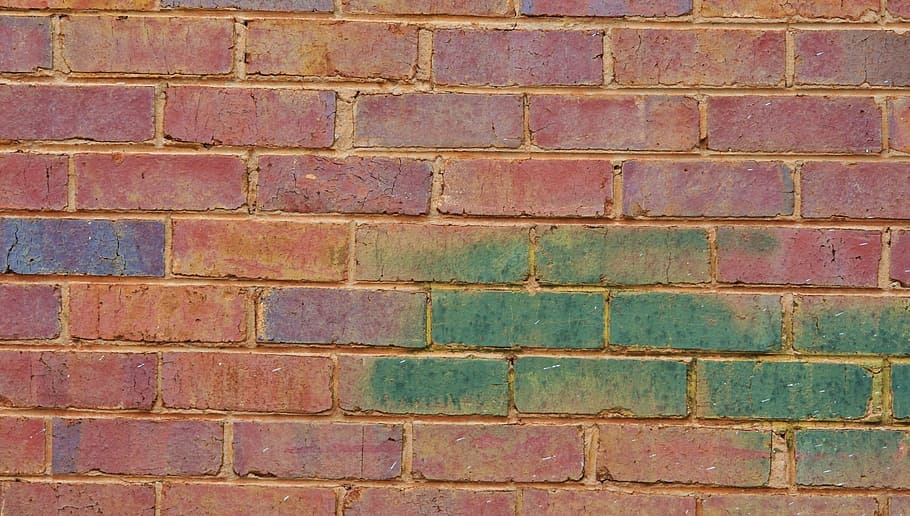red concrete brick wall with green and purple paint, tinted HD wallpaper