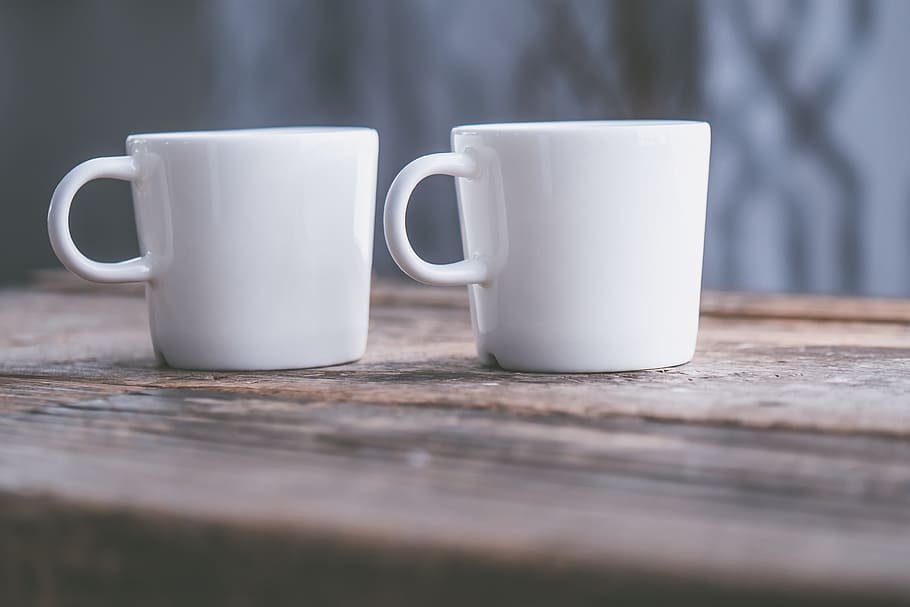 two white ceramic mugs, blur, ceramic cup, close-up, coffee cup HD wallpaper