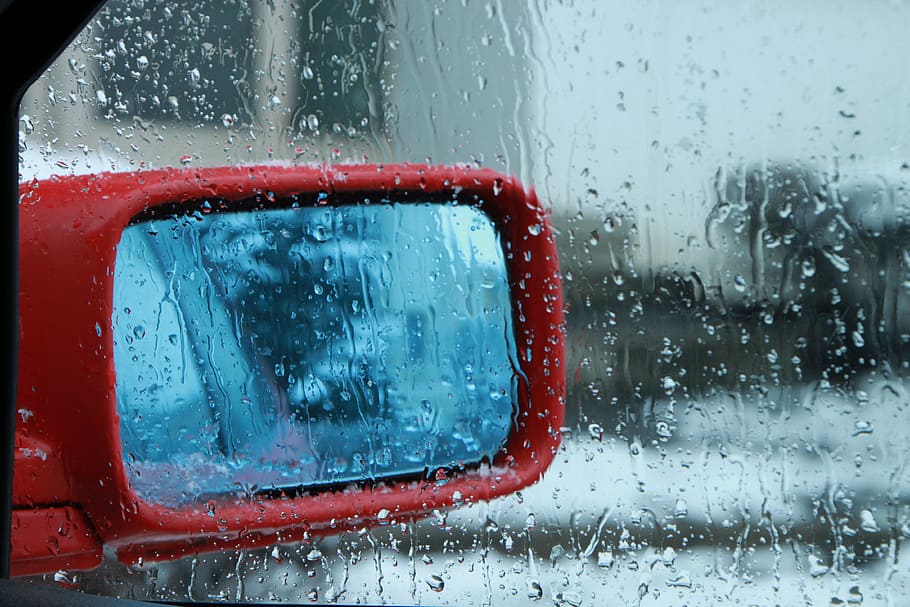 wet vehicle window with red side mirror on outside, blurred HD wallpaper