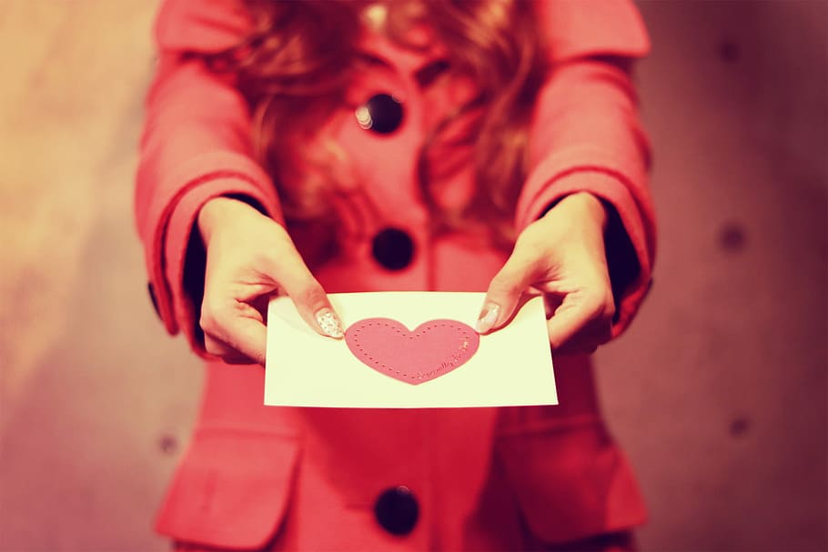 woman holding white and pink printer paper, love, people, heart Shape HD wallpaper