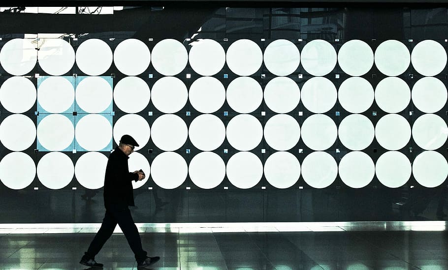 man walking near lights, man walking beside LED lights, dots HD wallpaper