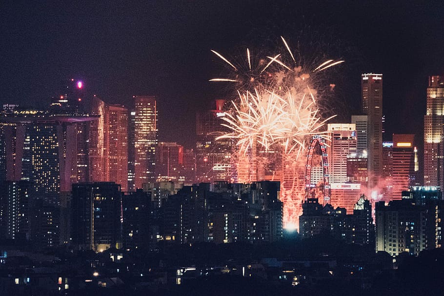 fireworks display in the city, fireworks on city buildingds, cityscape HD wallpaper