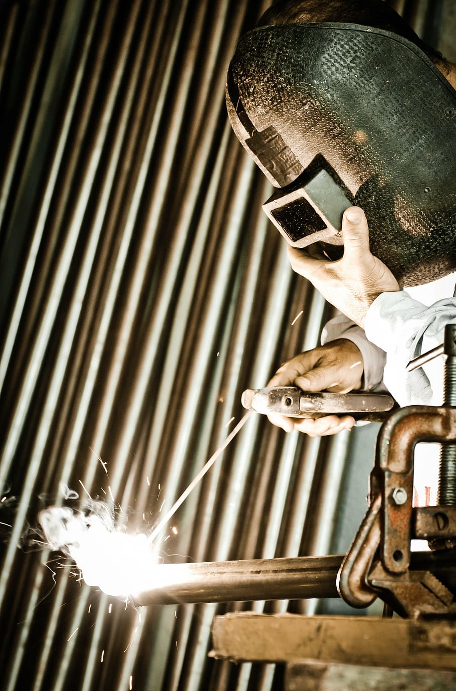 person wearing gray welding mask welding a steel bar, profession HD wallpaper