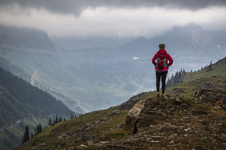person wearing red jacket standing at mountain cliff, mountains HD wallpaper