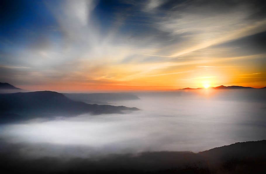 mountain and fog during golden hour, japan, aso, somma, sea of clouds