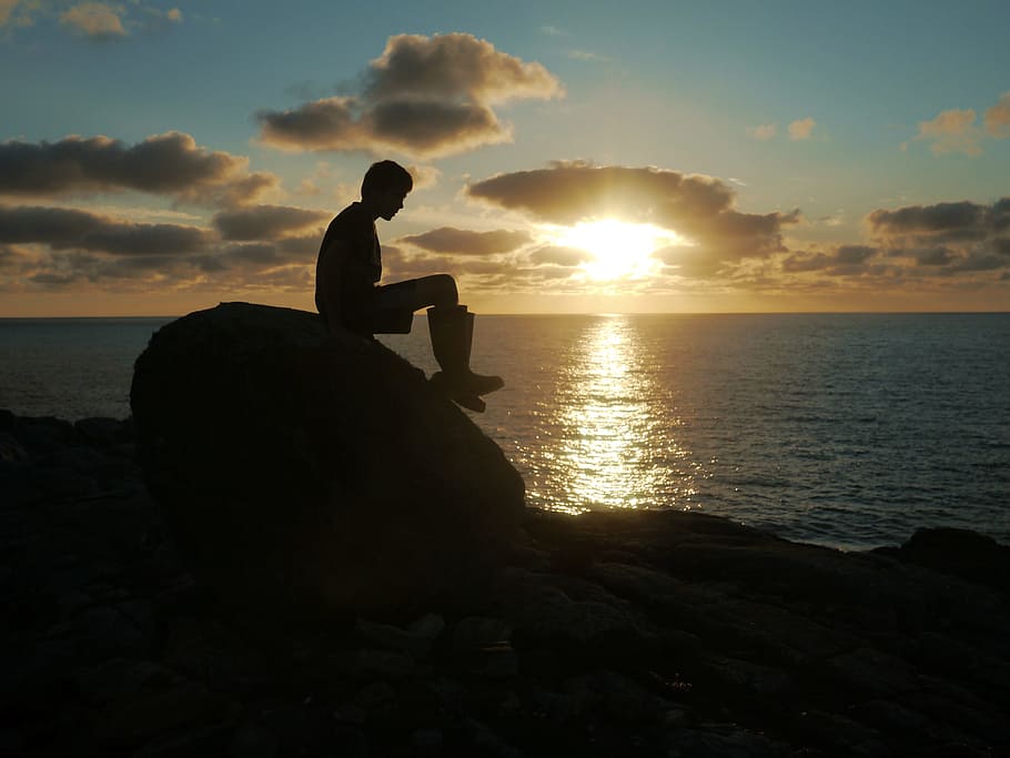 silhouette, boy, cliffs, lewis, sunset, wellington boots, sky HD wallpaper