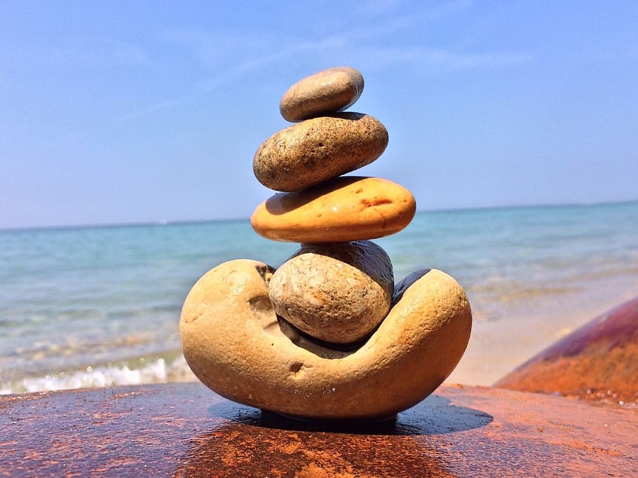shallow focus photography stone balancing art during daytime HD wallpaper