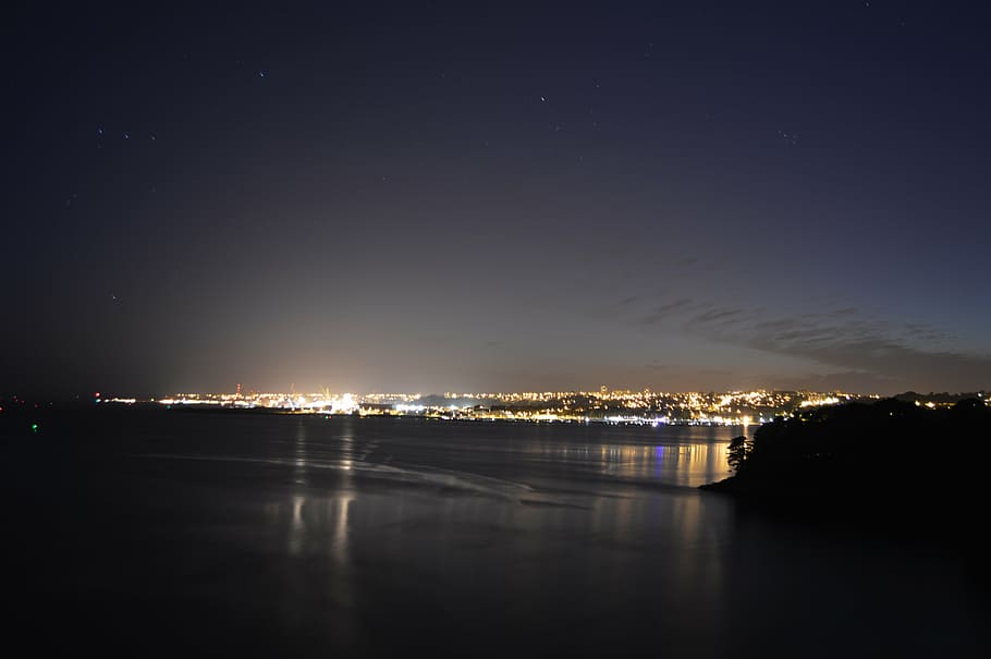 city, night, lights, evening, sea, water, side, reflections HD wallpaper