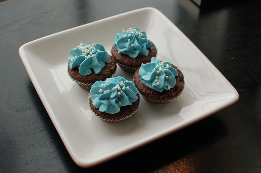 four cupcakes on white tray, plate, blue, dessert, frosting HD wallpaper