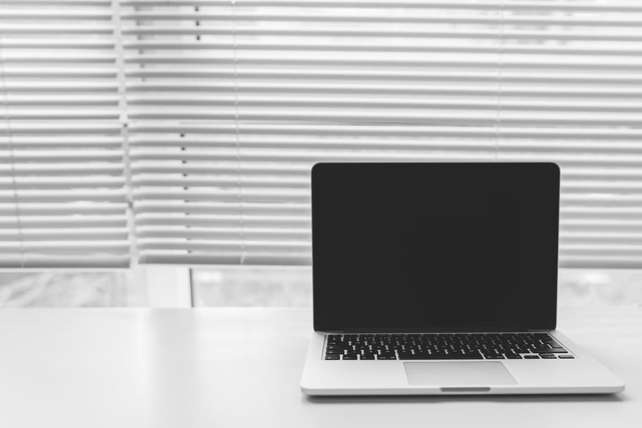 MacBook Pro, grayscale, photography, table, laptop, computer HD wallpaper
