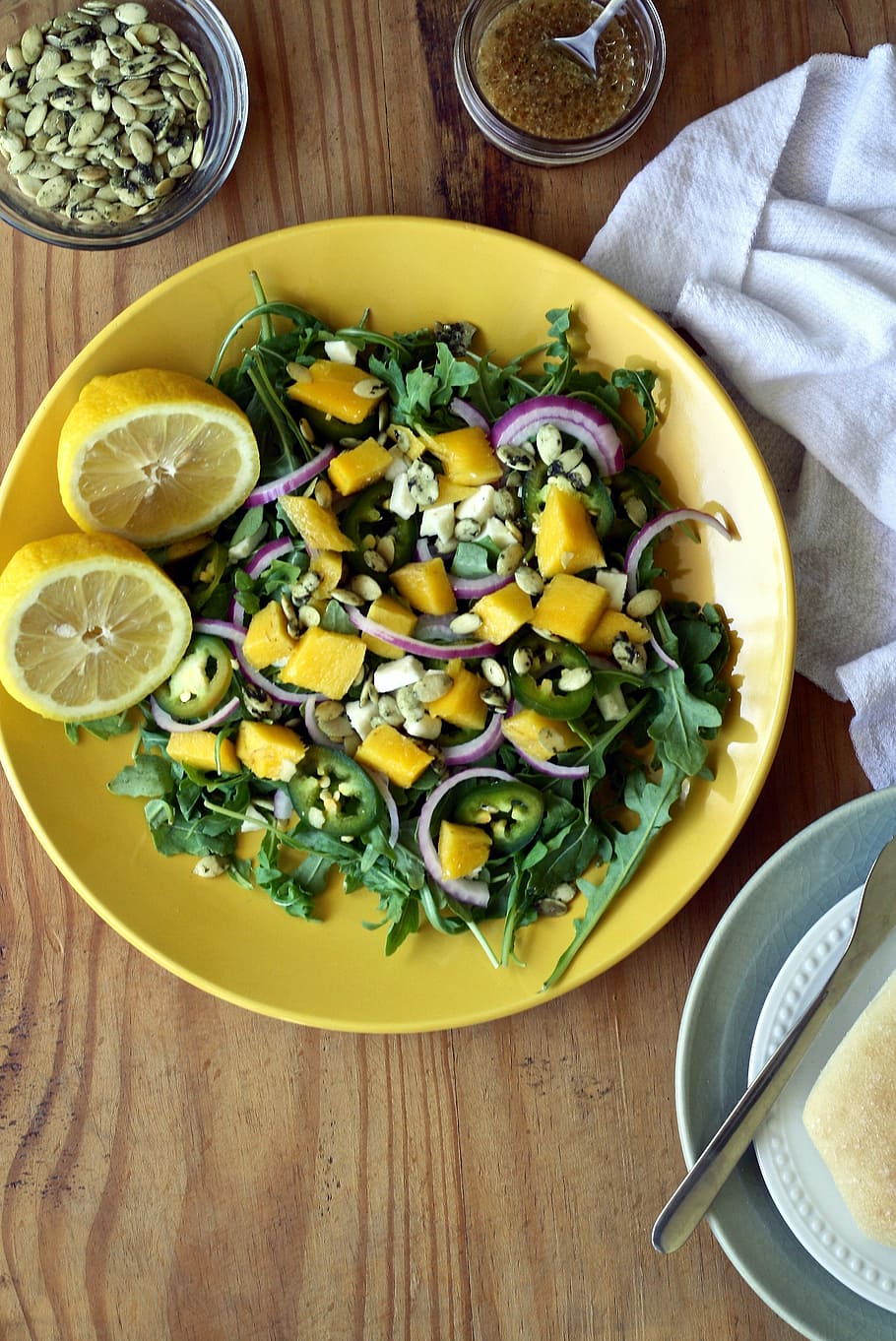 plate of vegetable, salad, mango, lemons, bread, lettuce, arugula HD wallpaper