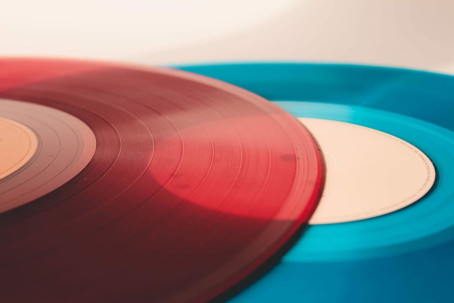 red and blue discs, closed up photo of red and blue vinyl records HD wallpaper