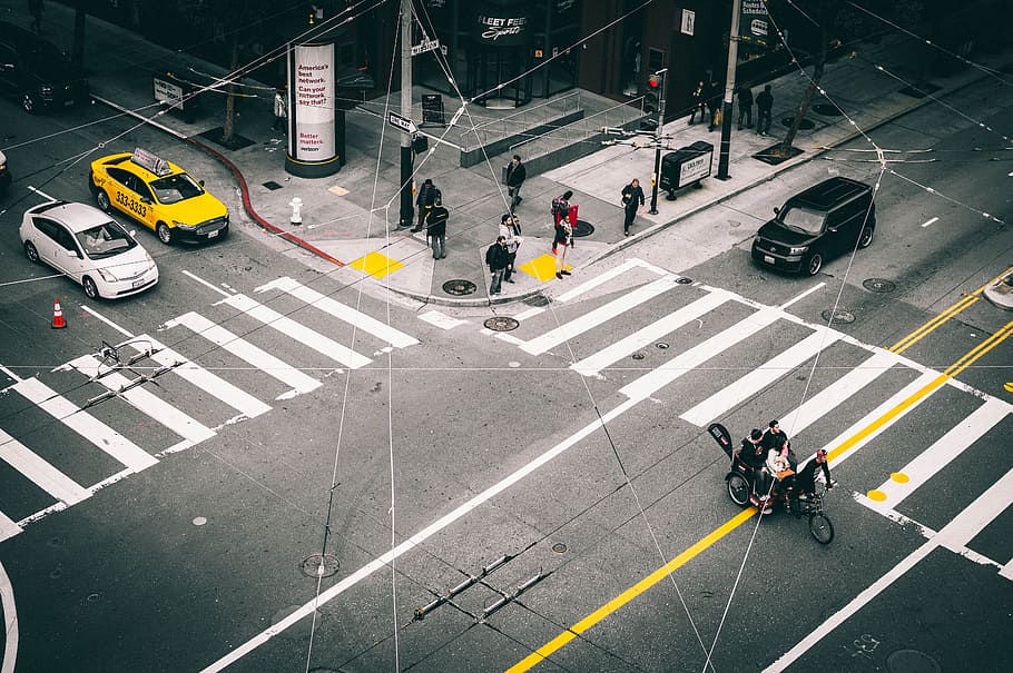 people standing near pedestrian lane, busy streets in aerial photograpgy HD wallpaper