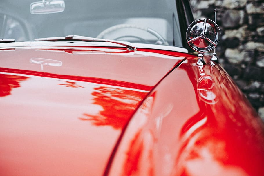 Closeup shot of an old classic car, various, red, old-fashioned
