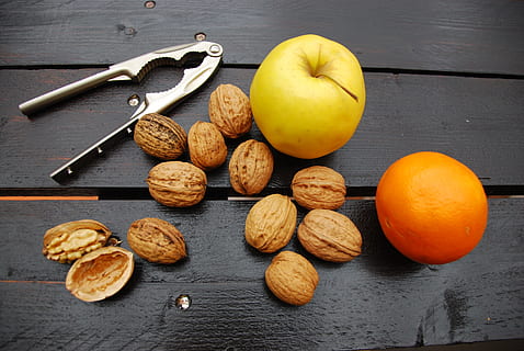 walnuts, orange, apple, dried fruit, wood, brown, food, shell HD wallpaper