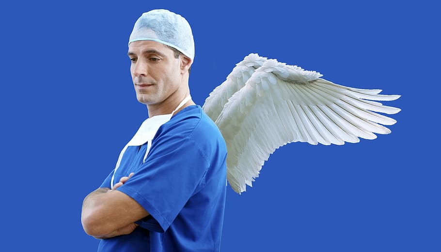 man with arms crossed and wings at the back, doctor, physician