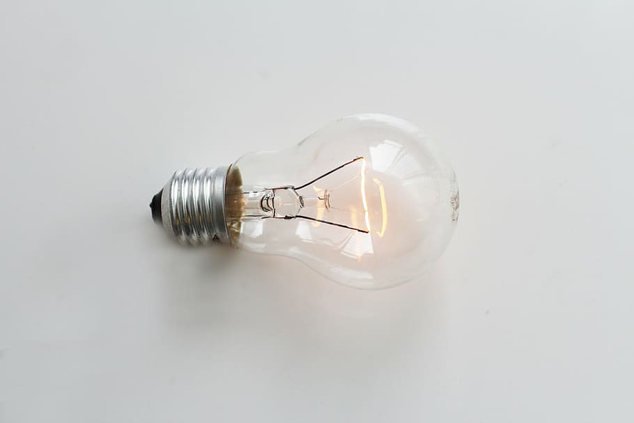 clear halogen bulb, close up, glowing, light, bright, electric HD wallpaper