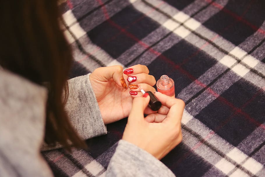 woman doing nailpolish, women, human Hand, close-up, females HD wallpaper