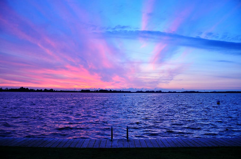 dock beside river, sea waves in front of docking pier, sunset HD wallpaper