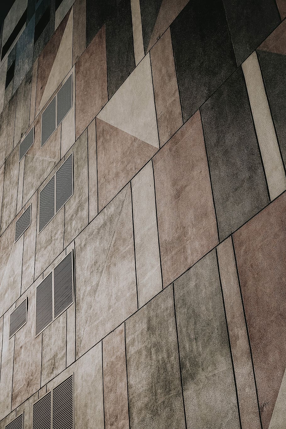 brown and black high-rise building wall, gray and beige geometrical surface HD wallpaper