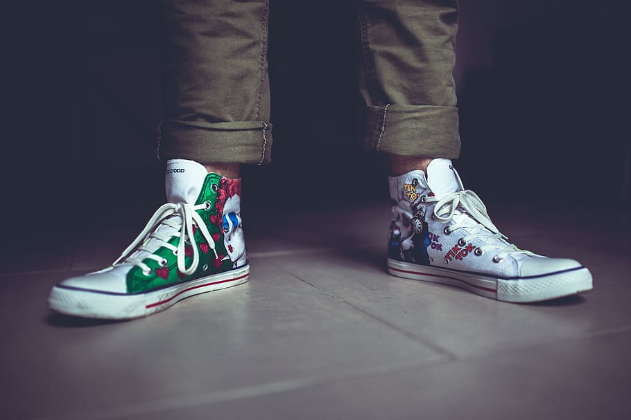 person wearing white high-top sneakers, handmade, shoes, colorful