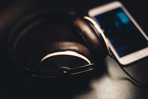 black corded headphones, selective focus photography of corded headphones beside smartphone HD wallpaper