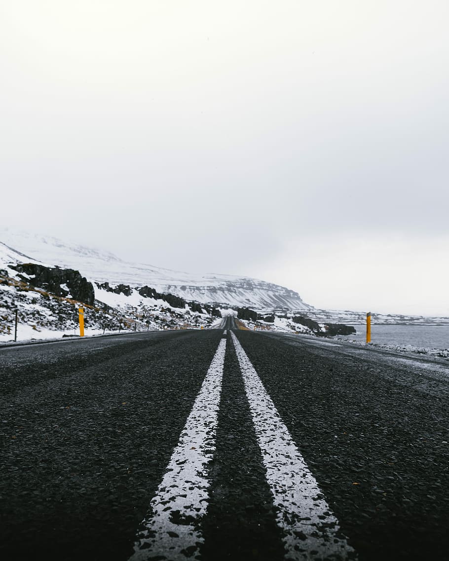 gray concrete road, photo of black and white asphalt road near body of water HD wallpaper