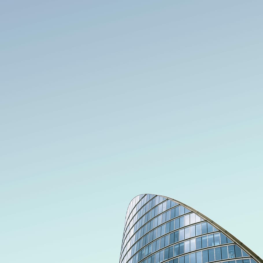 curtain wall building under blue sky, architectural photography of glass building HD wallpaper