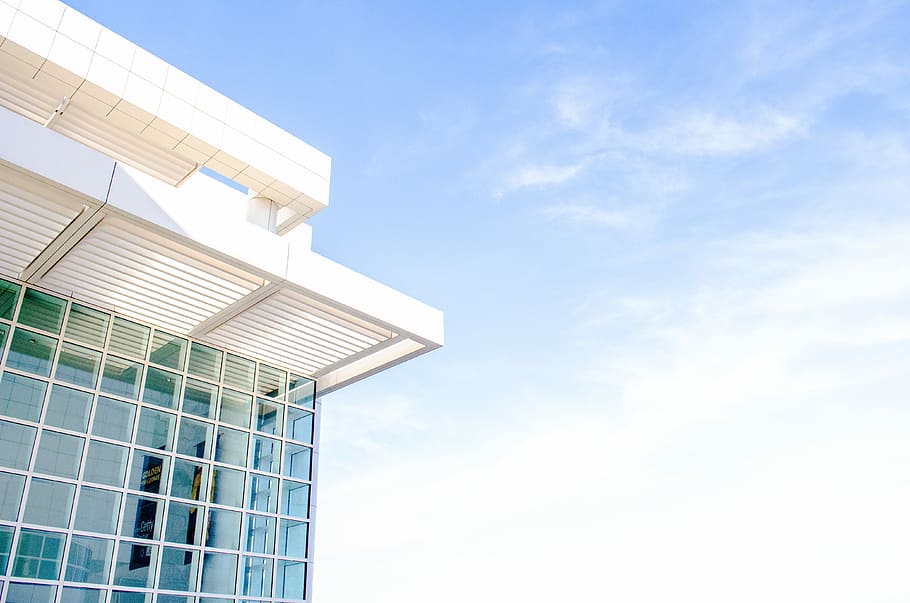 high-rise building under blue sky, glass window building under blue sky HD wallpaper
