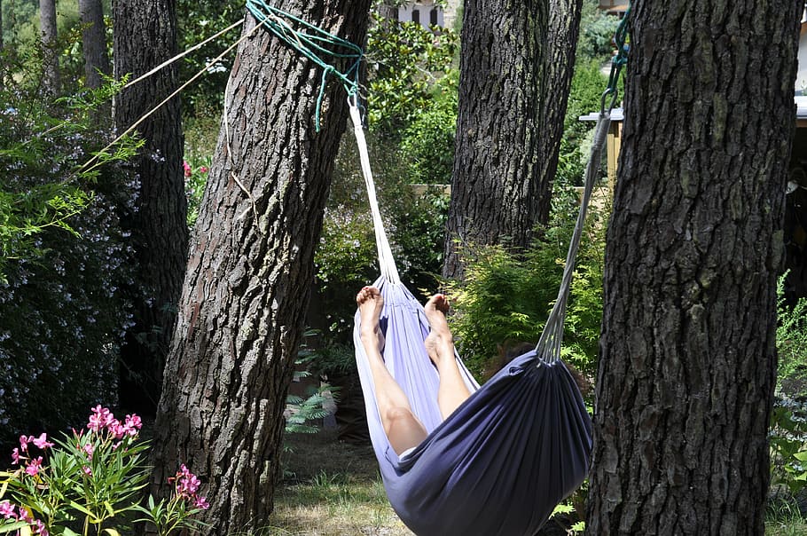 person lying down on blue hammock, nap, idleness, relaxation HD wallpaper