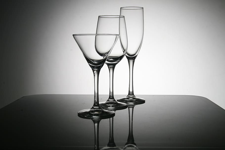 three clear cocktail glasses, water cup, studio, wines, drinking Glass
